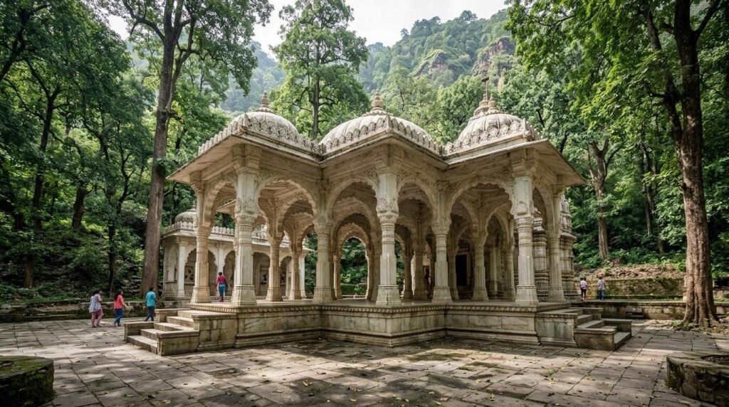 White marble temple colonnade in a forested valley